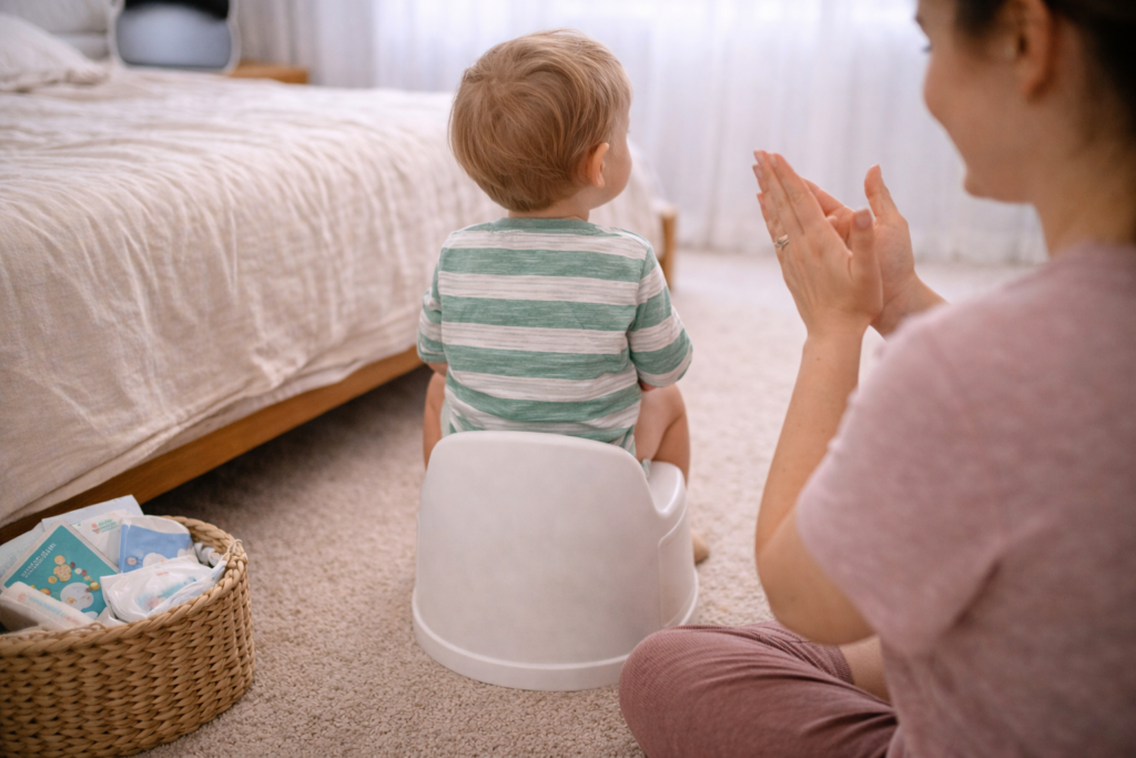 Mother and toddler in potty training moment